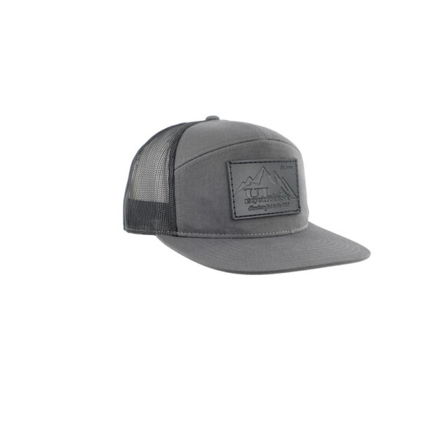 ULA Trucker Hat with a Black Grey front and brim, black mesh and a Black Leather Logo on the front.