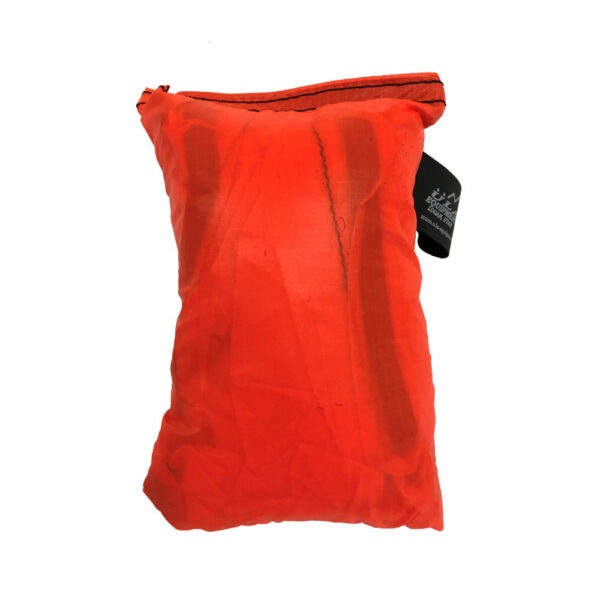 An ultralight ULA Pack Cover in it's built-in stuff sack in the color Fluorescent Orange