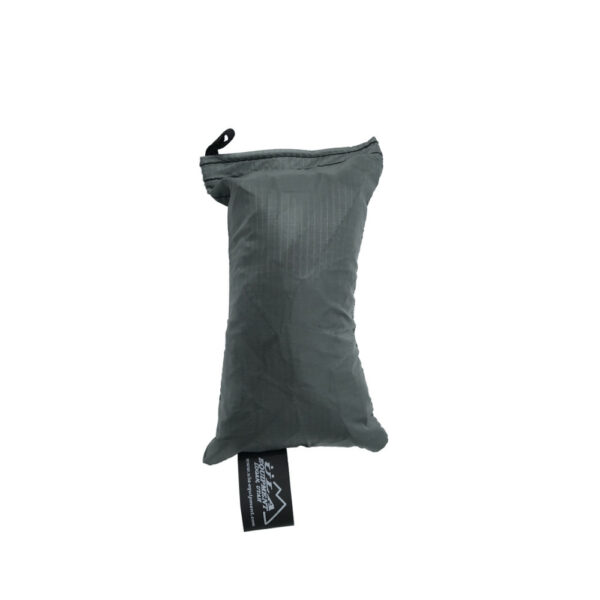 An ultralight ULA Rain Kilt in it's built-in stuff sack in the color Grey.