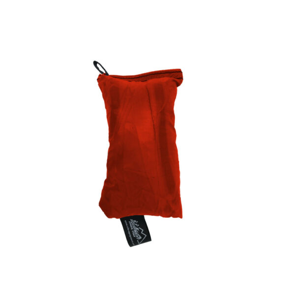 An ultralight ULA Rain Kilt in it's built-in stuff sack in the color Orange.