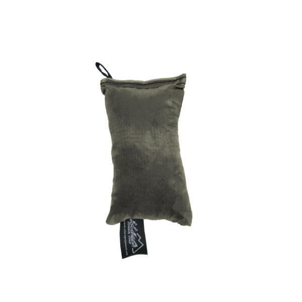 An ultralight ULA Rain Kilt in it's built-in stuff sack in the color Olive Drab.