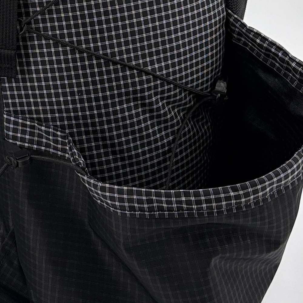 Two Red Robic 2024 Ohms sitting next to a rock on a trail