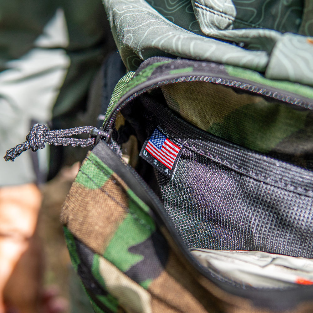 Woodland Cordura Spare Tire Woodland Cordura Spare Tire Inside View Showing Pockets and Made In America Tag