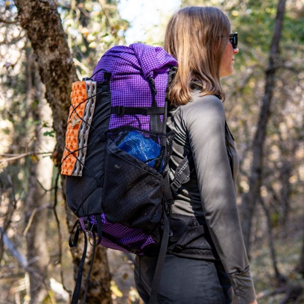 A female hiker in a purple Circuit SV