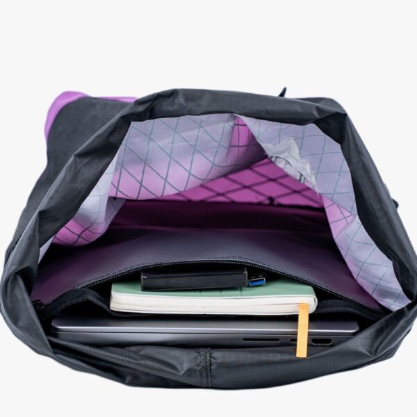XPac Packrat open showing interior compartment and laptop sleeve.