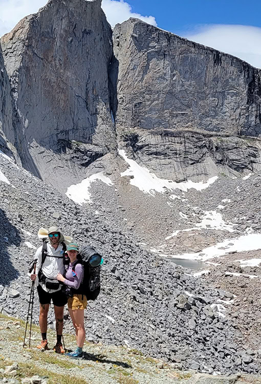 Wyoming Backpacker puts a Bear Vault Bear Canister into a ULA CDT Backpack