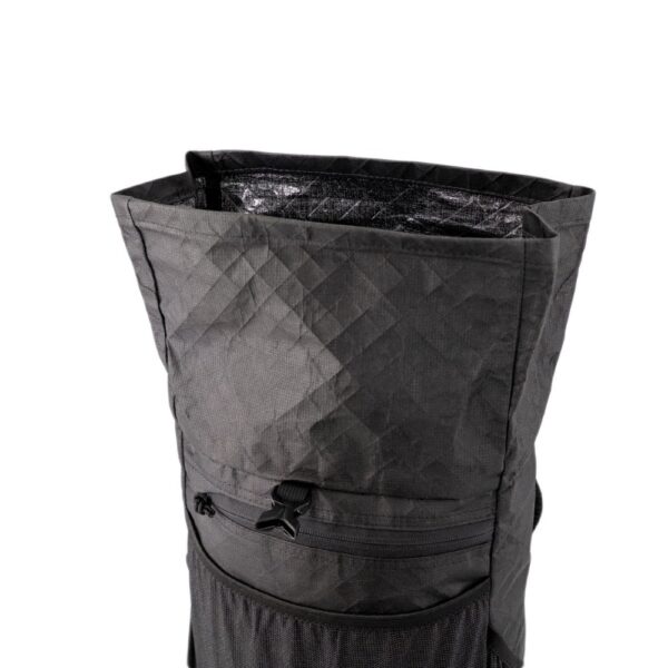 An open view of the ULA Ultra Node Daypack, showing the roll-top closer fully open. It adds extra space to the pack.