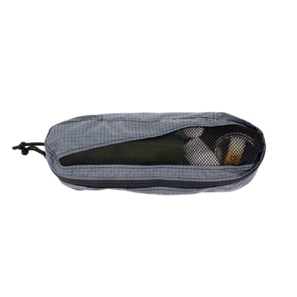 ULA Small Packing Cube in castlerock. Cube is partially open and holds a handful of toiletries.