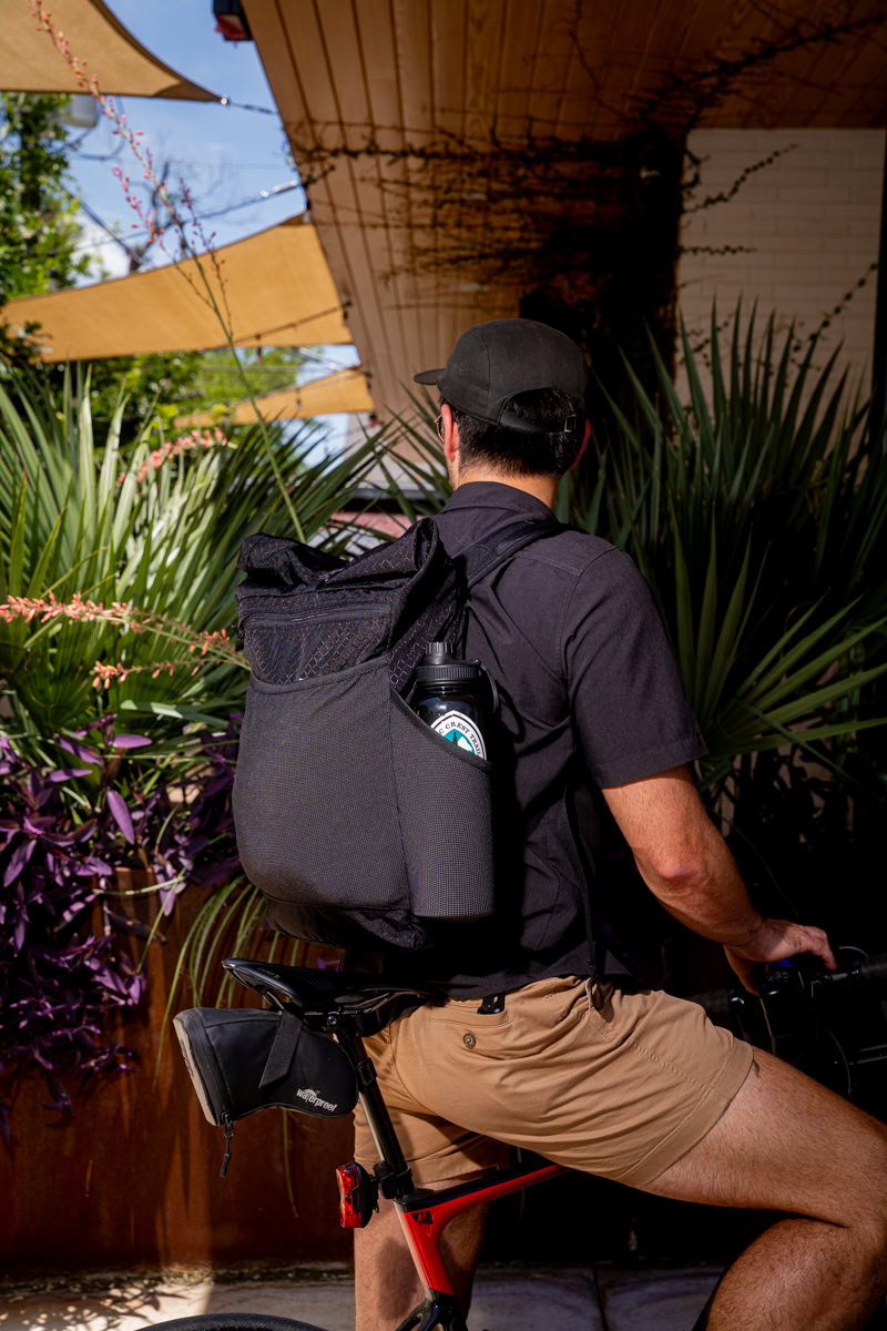 Node Backpacker puts a Bear Vault Bear Canister into a ULA CDT Backpack