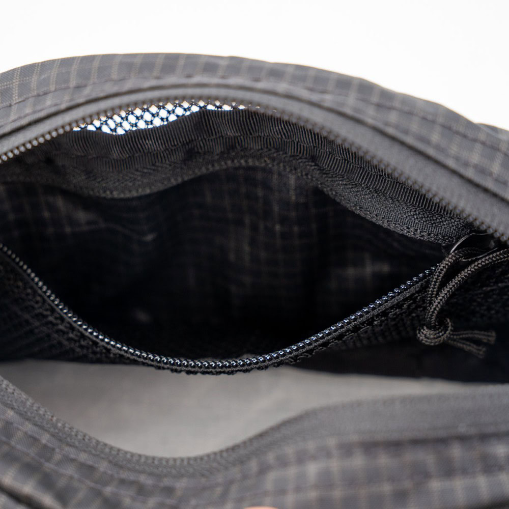 ULA Toiltry Kit: Inside Pocket ULA Toiletry Kit unzipped and showing the interior zippered pocket.