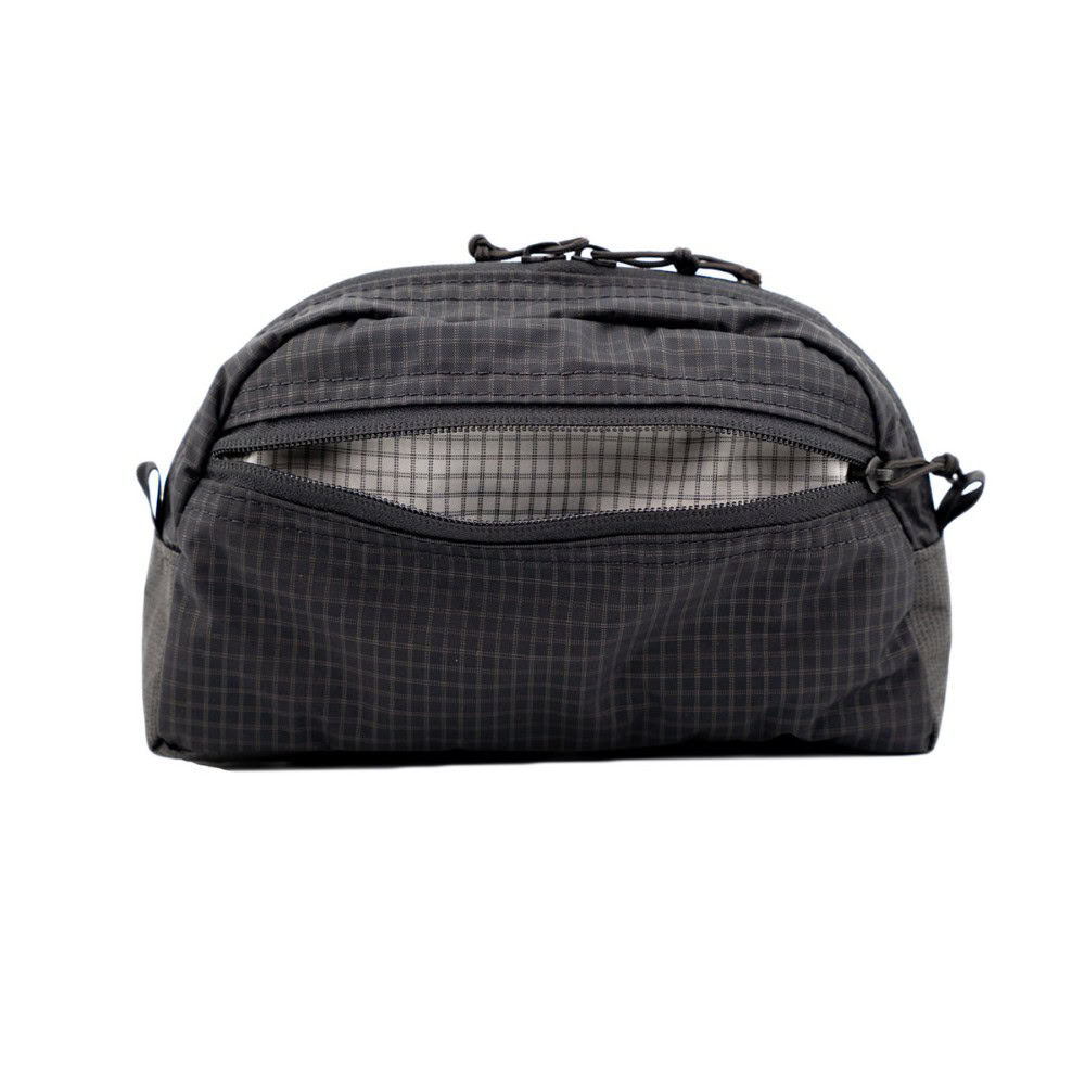 ULA Toiltry Kit: Back View Back view of the ULA toiletry kit with the back exterior pocket open.