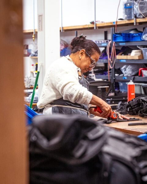 A ULA team member creating ULA schoulder straps in our Logan, Utah shop.