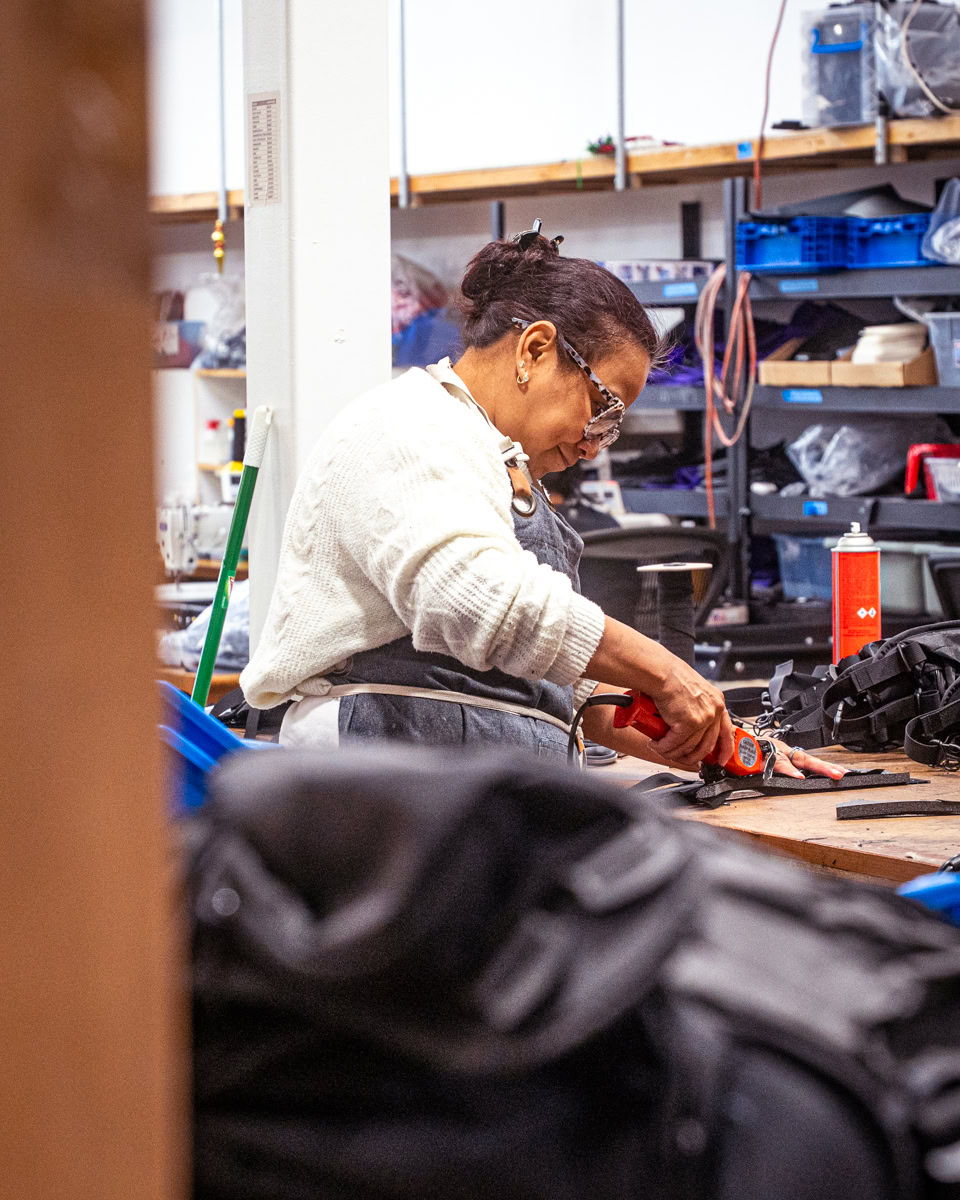 Shop Photos-14 Backpacker puts a Bear Vault Bear Canister into a ULA CDT Backpack