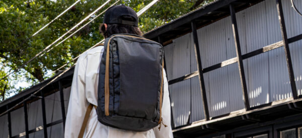 A man wearsa his ULTRA Muse Cicada down the street.