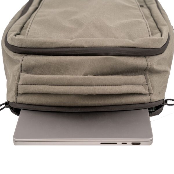 X50 Cicada Daypack laptop sleeve with laptop sticking out