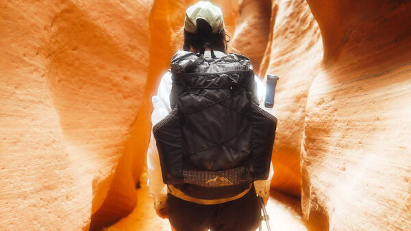 A woman hiking in a Utah canyon