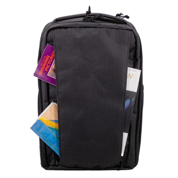 The hidden front pockets of the Ultra Cicada with Pockets showing items pertruding from the pockets