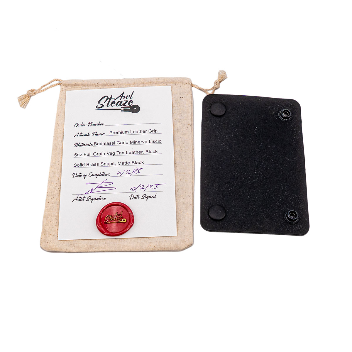 Awl Steaze Dragonfly Grip-it next to the custom bag it comes in and the certificate of authentification
