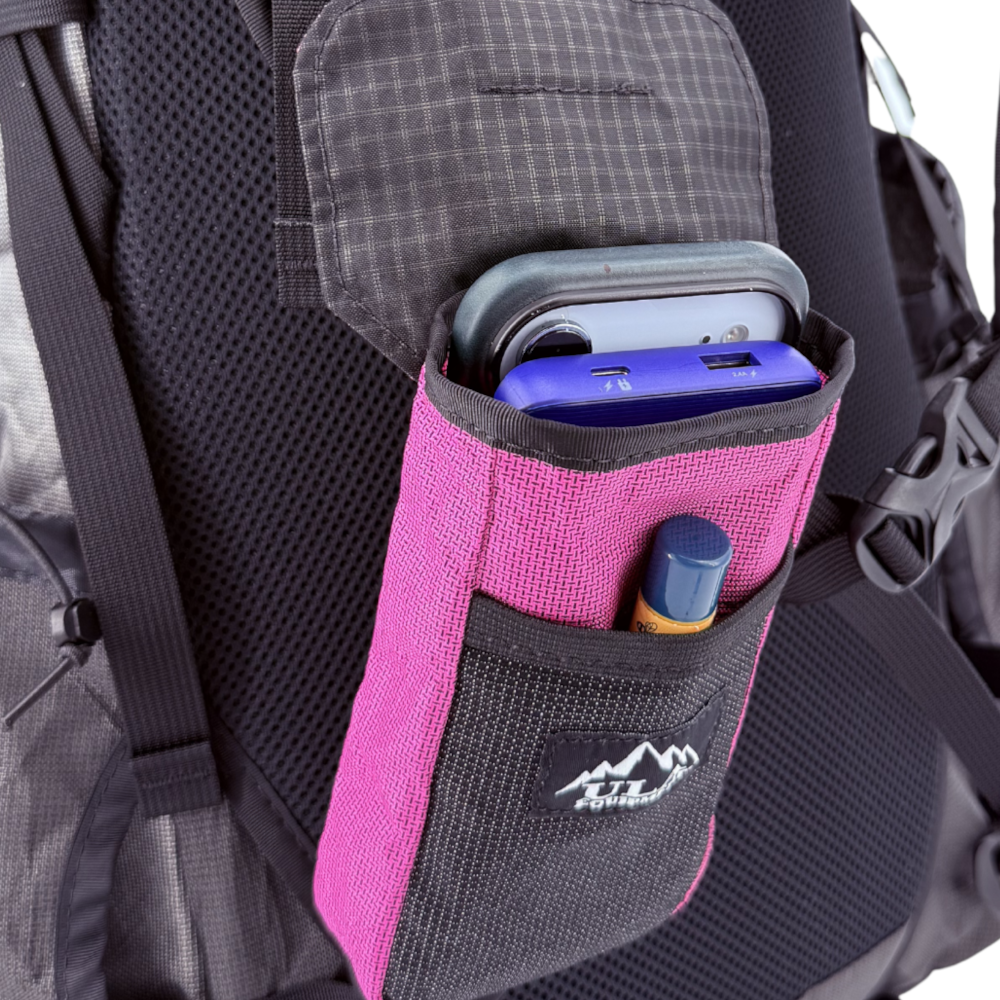 Polarity Pocket on a backpack in ULTRA 200X Fuschia