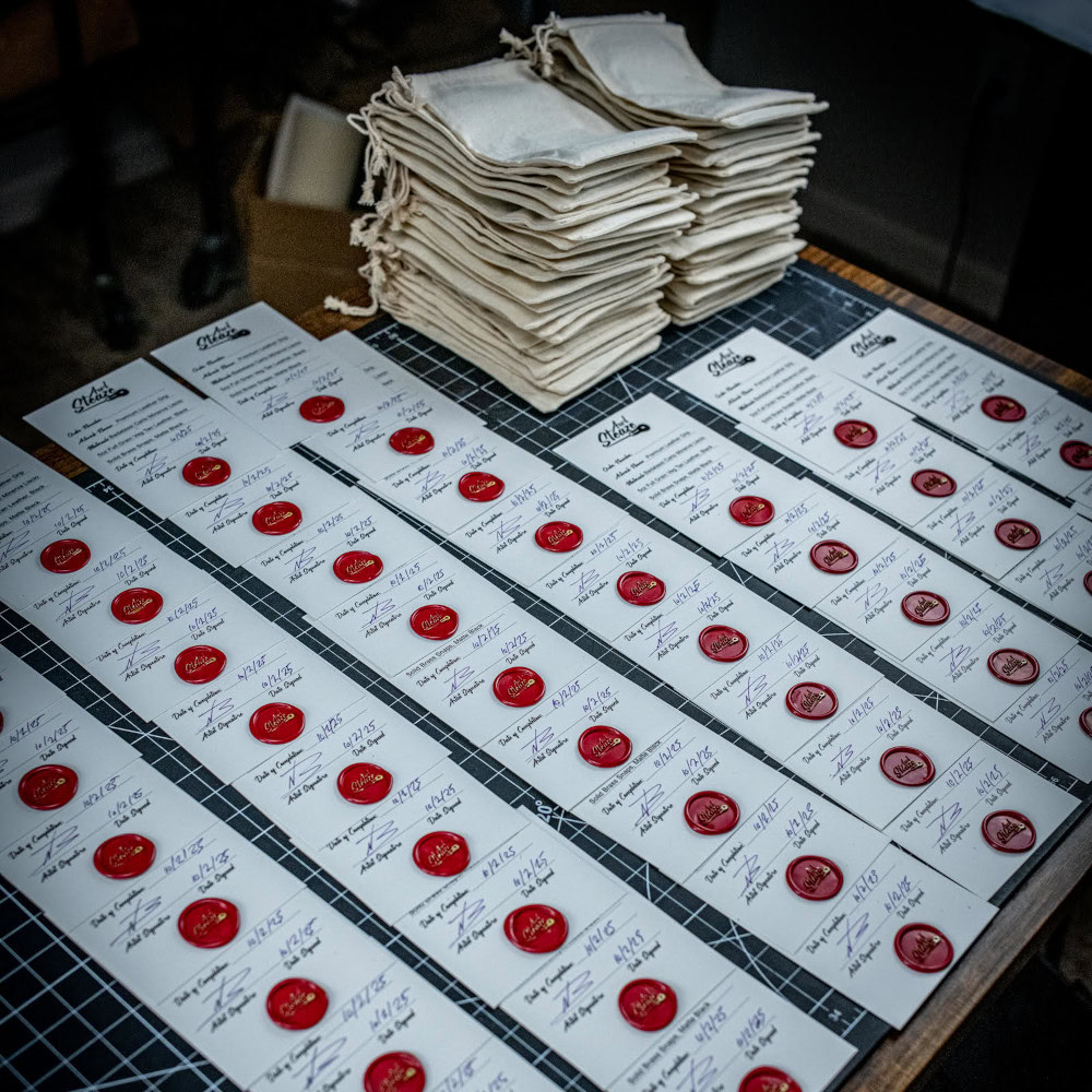 ULA Dragonfly Grip-It Authenticity Cerrtificates lined up on a desk