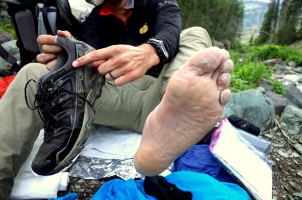 A hiker shows the impact of waterproof shoes