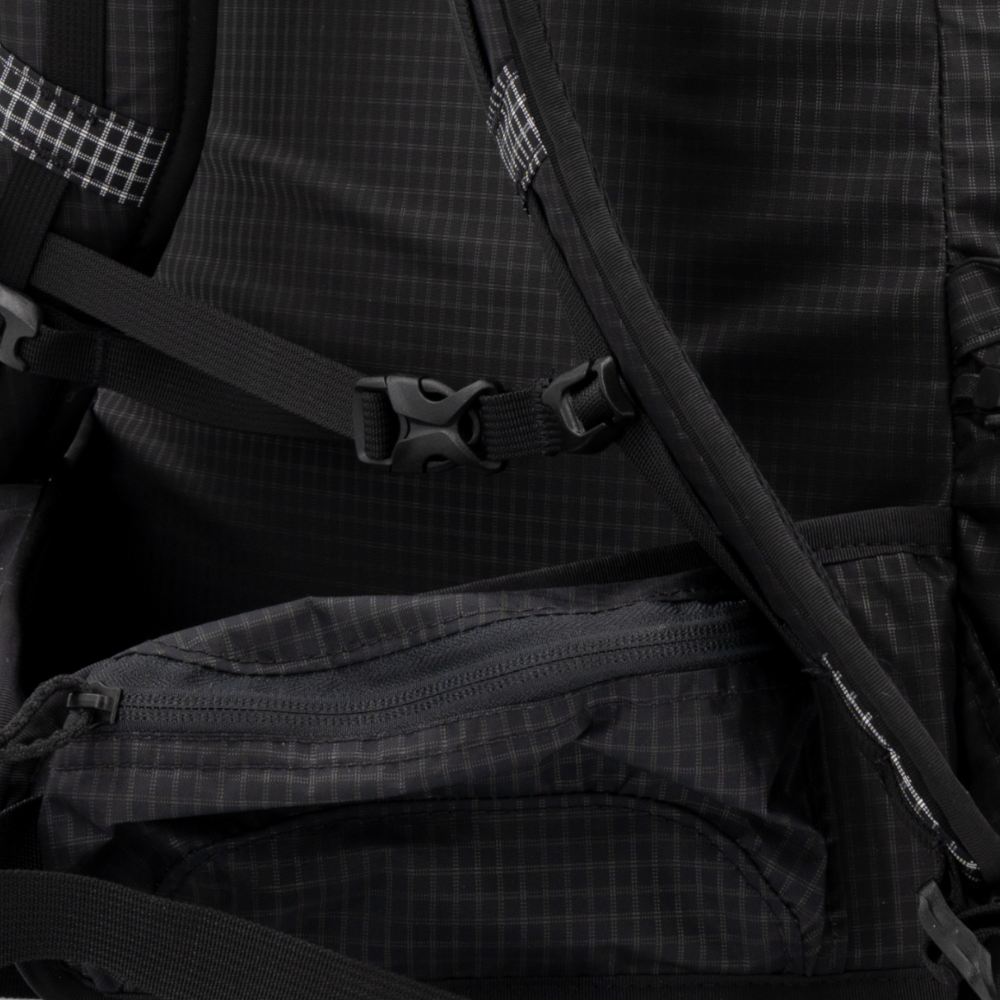 Red Robic 2024 Ohm Bottom Strap Detail, holding a tent